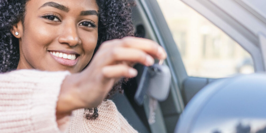 woman holding key arval release business